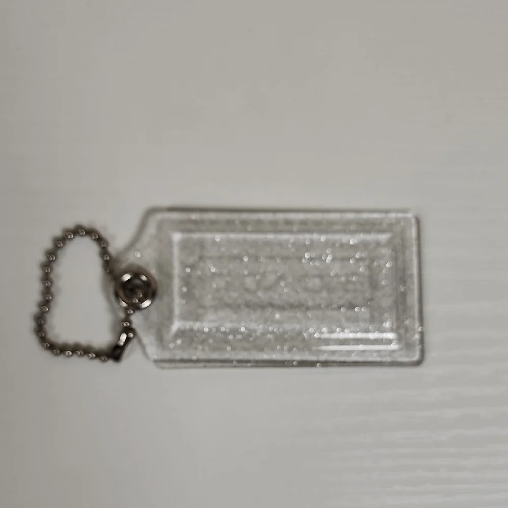 Coach Poppy Clear/Silver Sparkle Hangtag